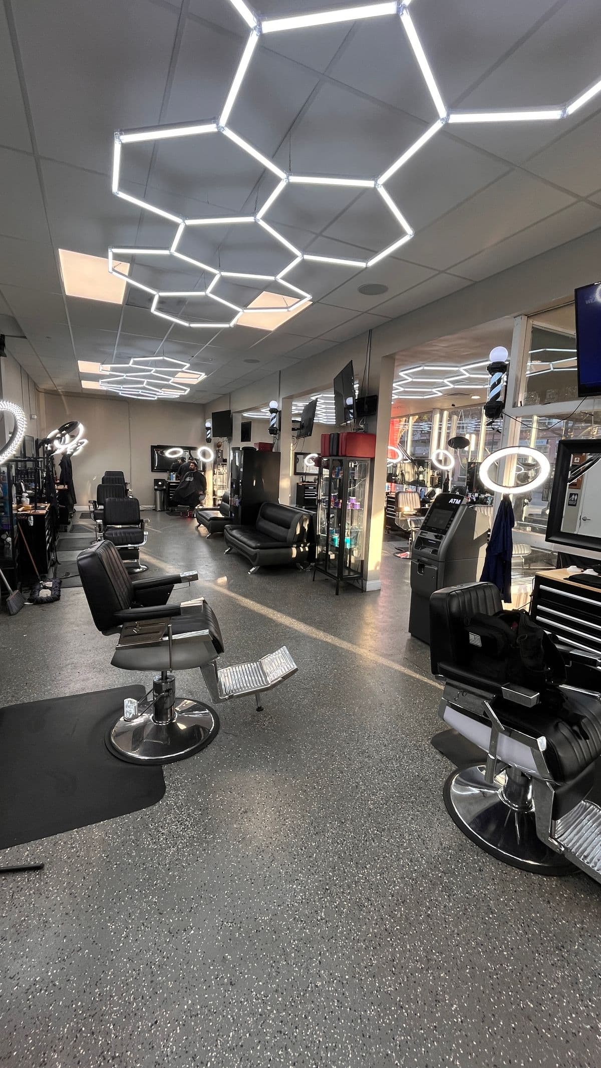 Barber chairs and hexagon LED ceiling lights